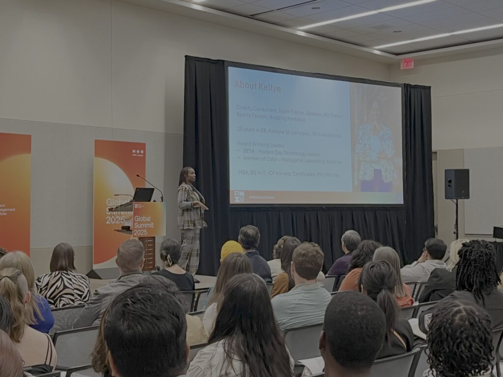 Image of Kellye on stage during her PMI Global Summit session